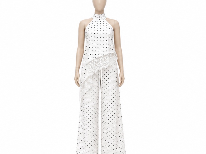 Ensemble femme deux pièces blanc à pois noirs.